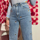 Jeans a palazzo con cuori gioiello