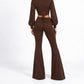 Tuta con stringhe posteriori Brown